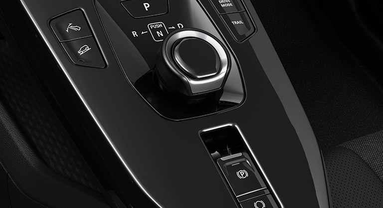 Der Wählhebel des e VITARA mit den verschiedenen einstellbaren Fahrmodi.